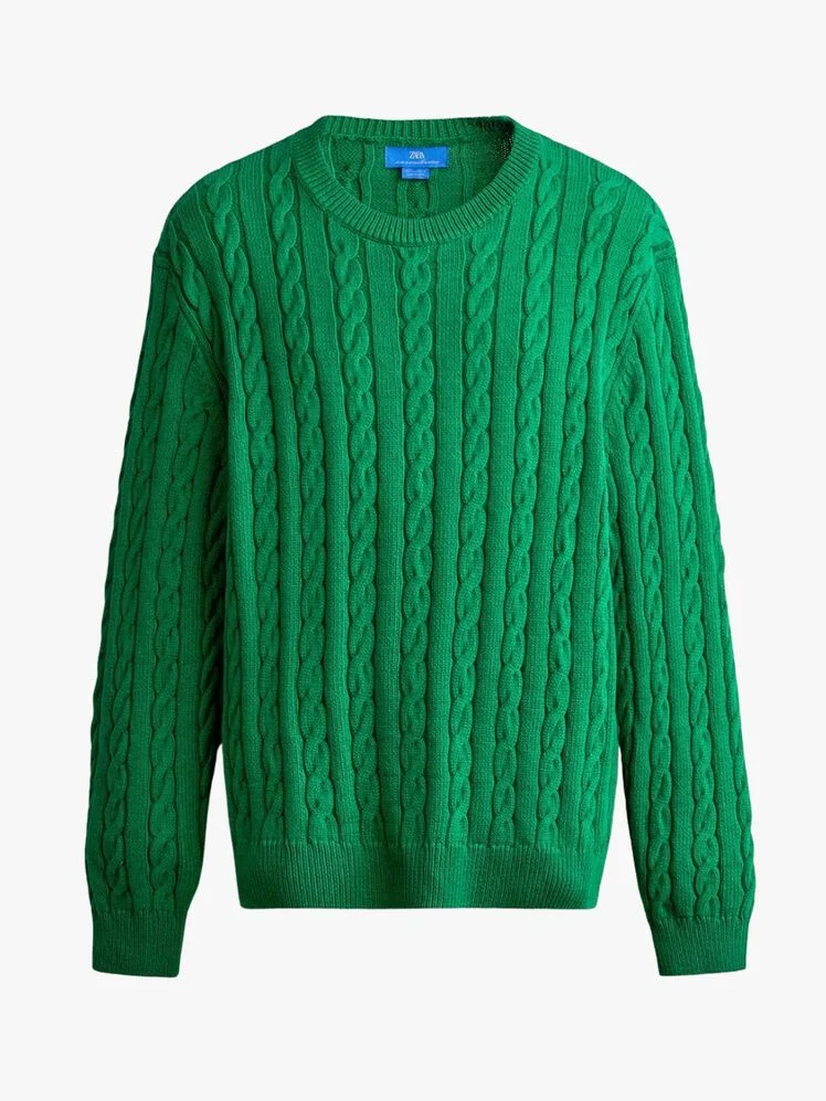 Image may contain: Clothing, Knitwear, Sweater, and Sweatshirt