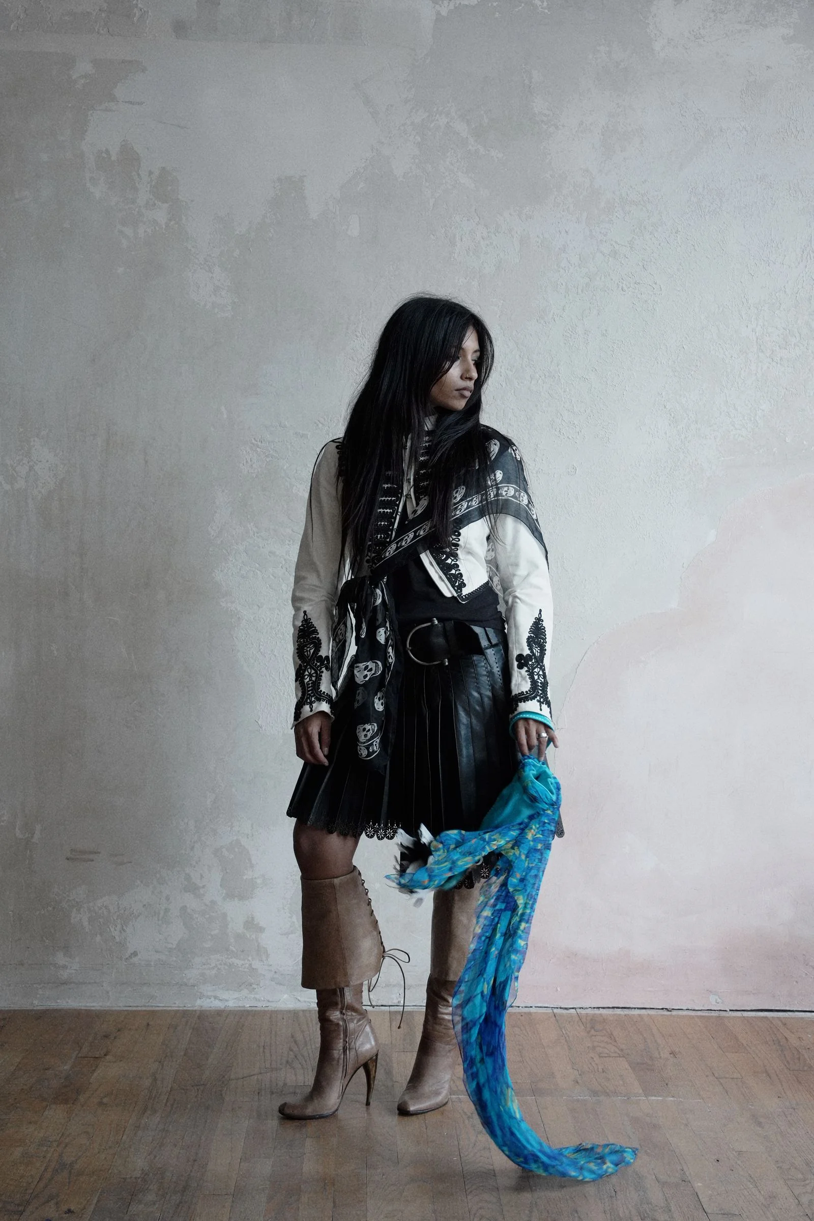 Image may contain Clothing Pants Black Hair Hair Person Adult Sleeve and Coat