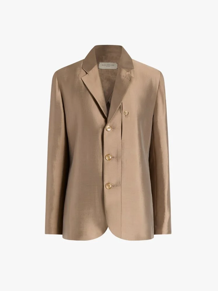 Image may contain: Blazer, Clothing, Coat, Jacket, Formal Wear, Suit, Home Decor, and Linen