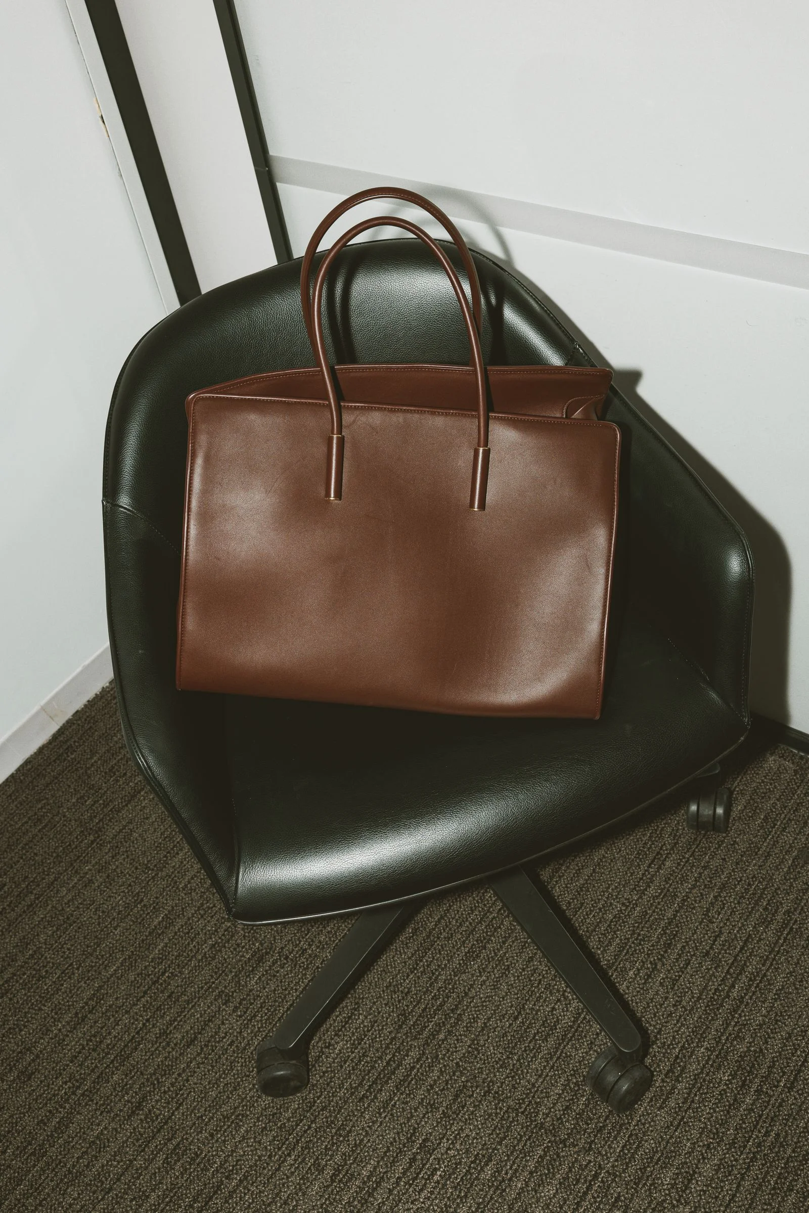 Image may contain Accessories Bag Handbag Tote Bag Purse and Furniture