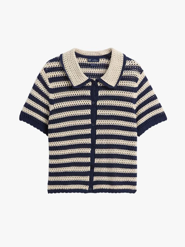 Image may contain: Clothing, Knitwear, and Sweater
