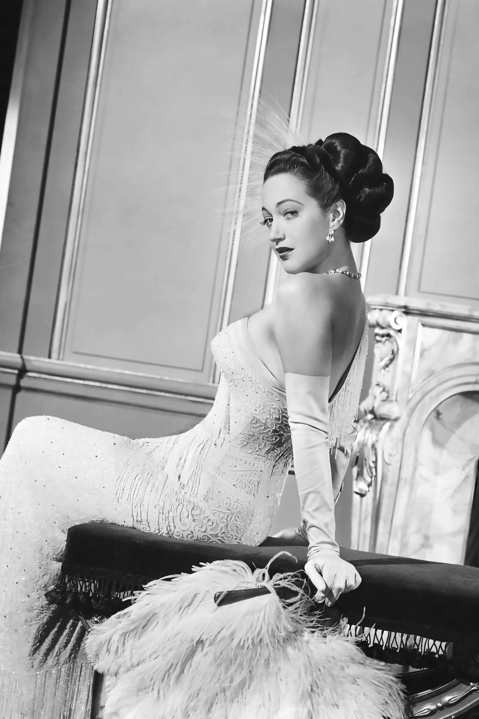 Image may contain Dorothy Lamour Person Formal Wear Clothing Dress Adult Wedding Fashion Gown and Wedding Gown