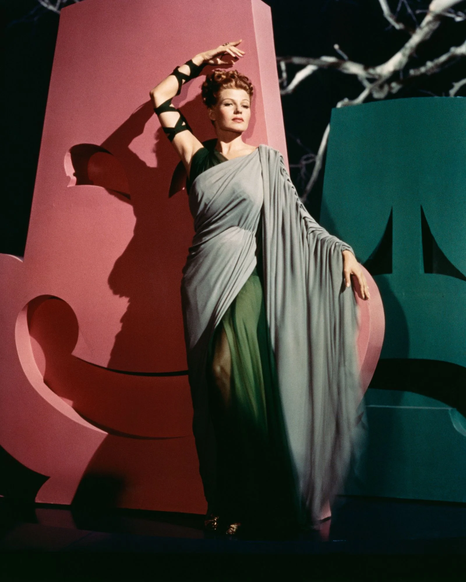 Image may contain Rita Hayworth Performer Person Solo Performance Adult Clothing Dress and Dancing
