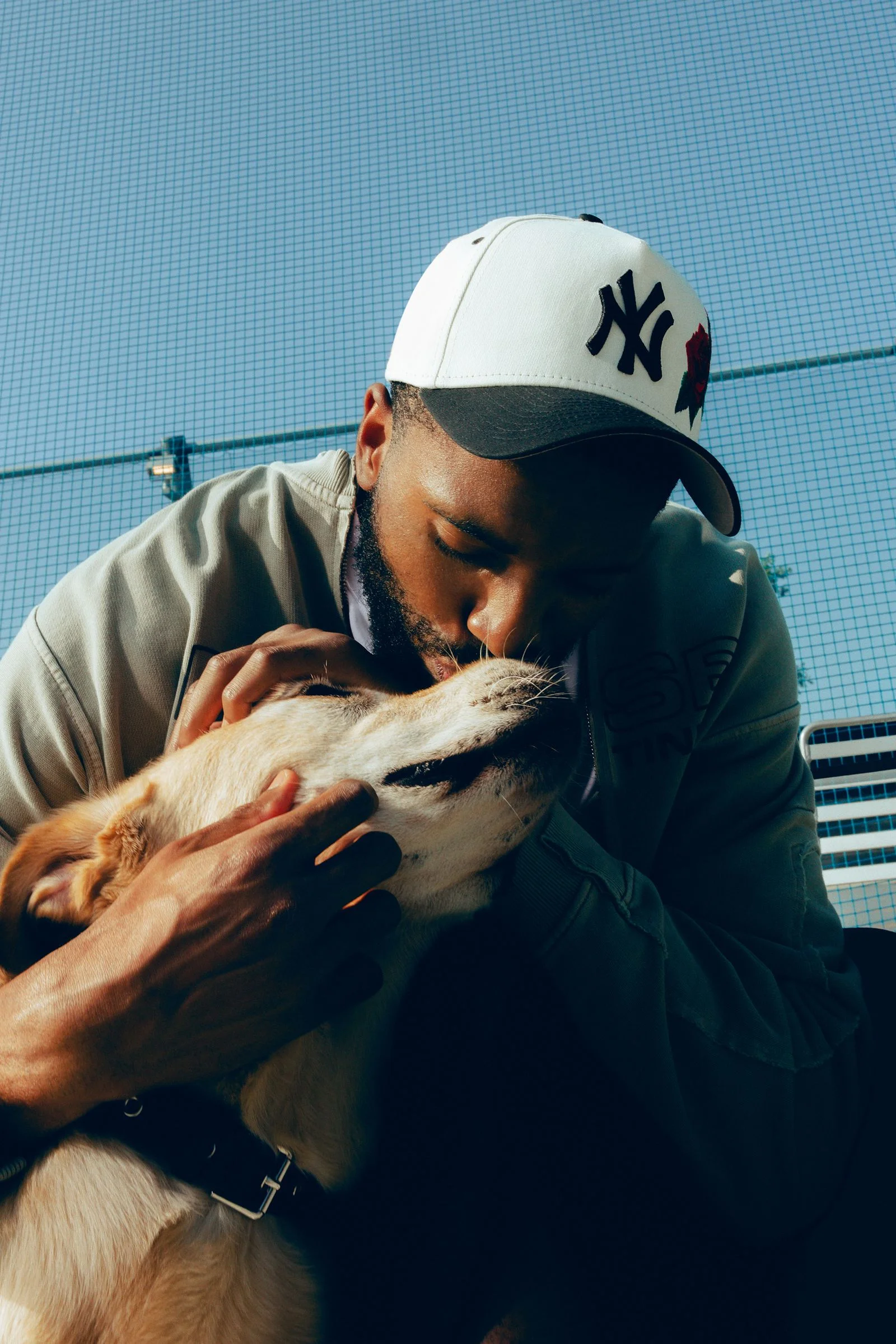 Image may contain Mikal Bridges Baseball Cap Cap Clothing Hat Adult Person Face Head Photography and Portrait