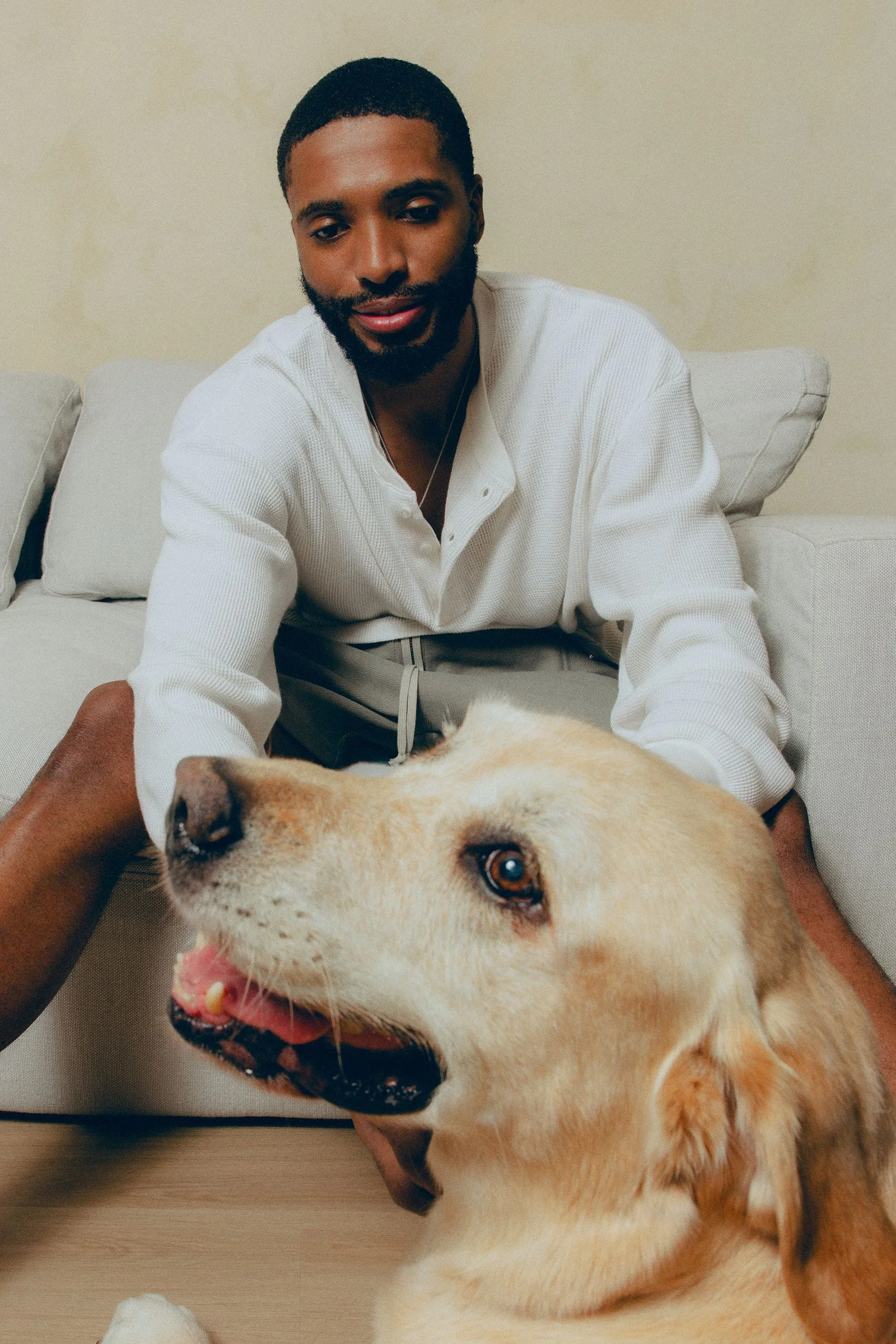 Image may contain Mikal Bridges Person Sitting Adult Head and Face