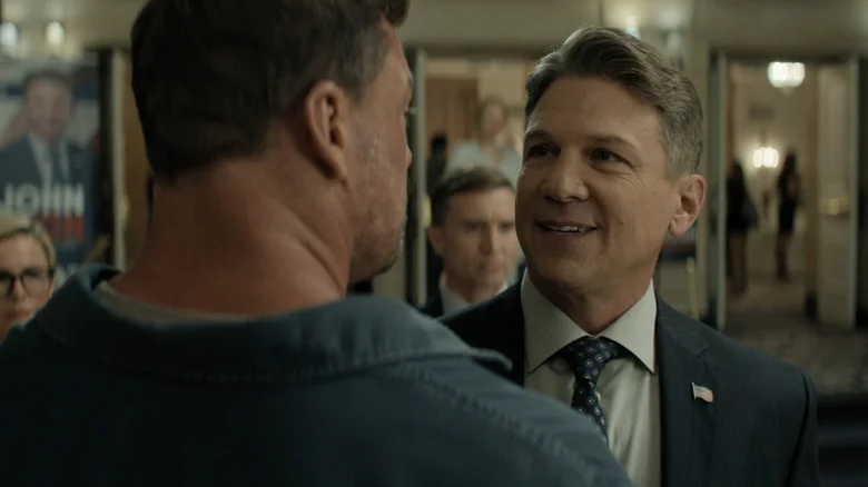 Marc Blucas's John Sampson smiles at Alan Ritchson's Jack Reacher in Reacher