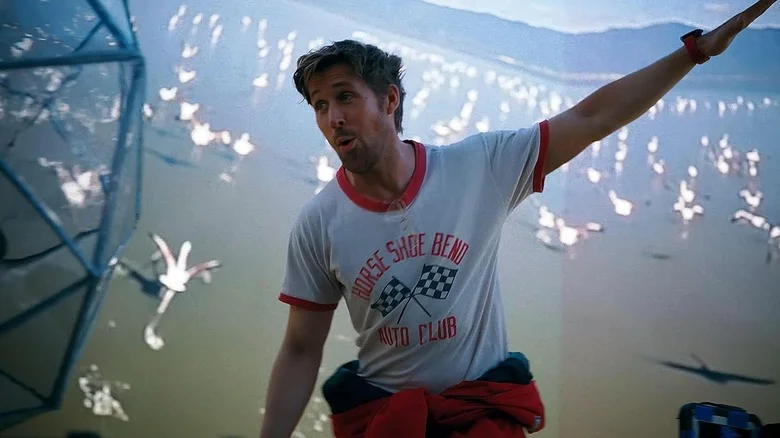 Ryan Gosling as Ryland Grace in a simulation of the beach with Rocky in Project Hail Mary