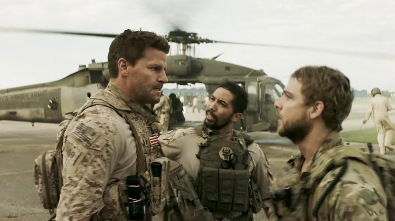 David Boreanaz's Jason Hayes confronts Max Thieriot's Clay Spenser as Neil Brown Jr's Raymond Perry tries to separate them in SEAL Team