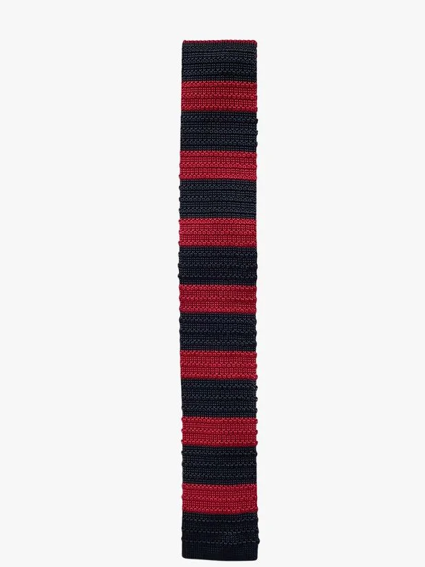 Image may contain Woven Accessories Formal Wear Tie and Strap