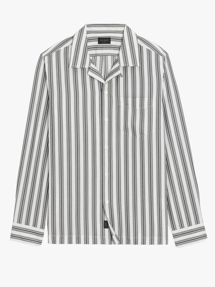 Image may contain Clothing Shirt Long Sleeve Sleeve and Dress Shirt