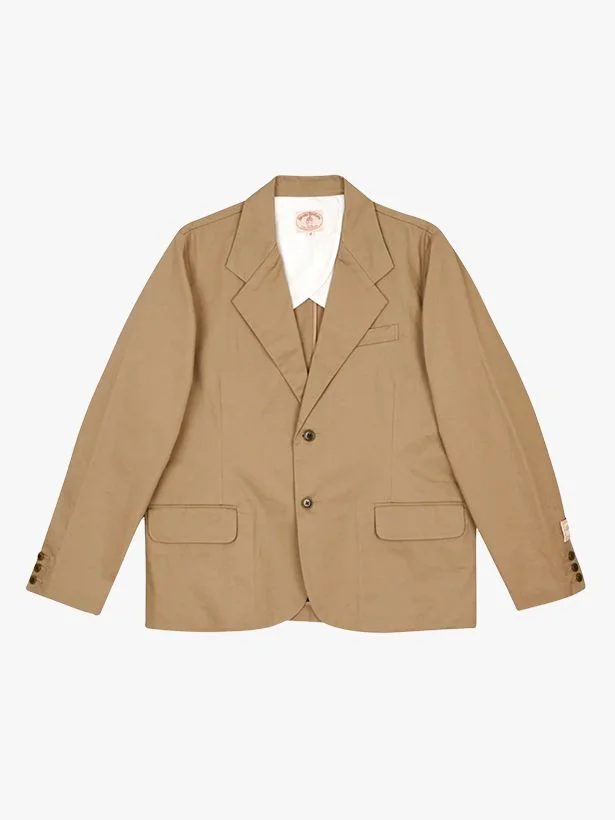 Image may contain Blazer Clothing Coat Jacket and Khaki