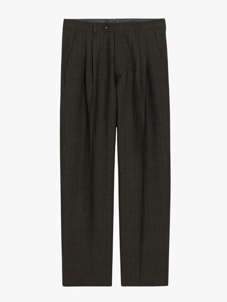 Image may contain Clothing Pants Home Decor Linen and Jeans