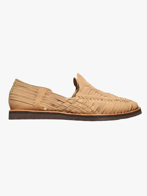 Image may contain Clothing Footwear Sandal Shoe Suede and Woven
