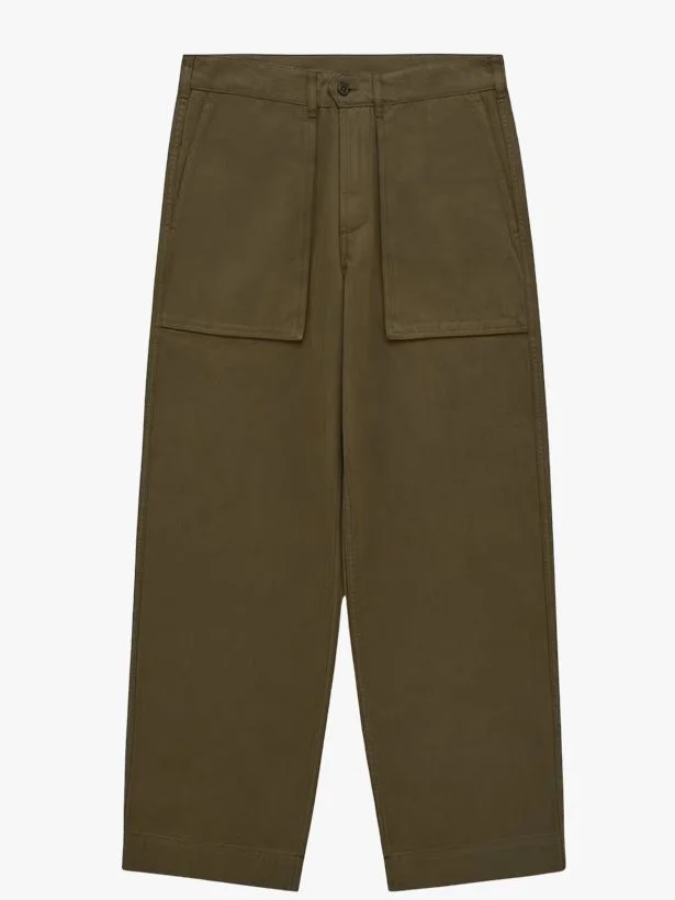Image may contain Clothing Pants Khaki Shorts and Coat
