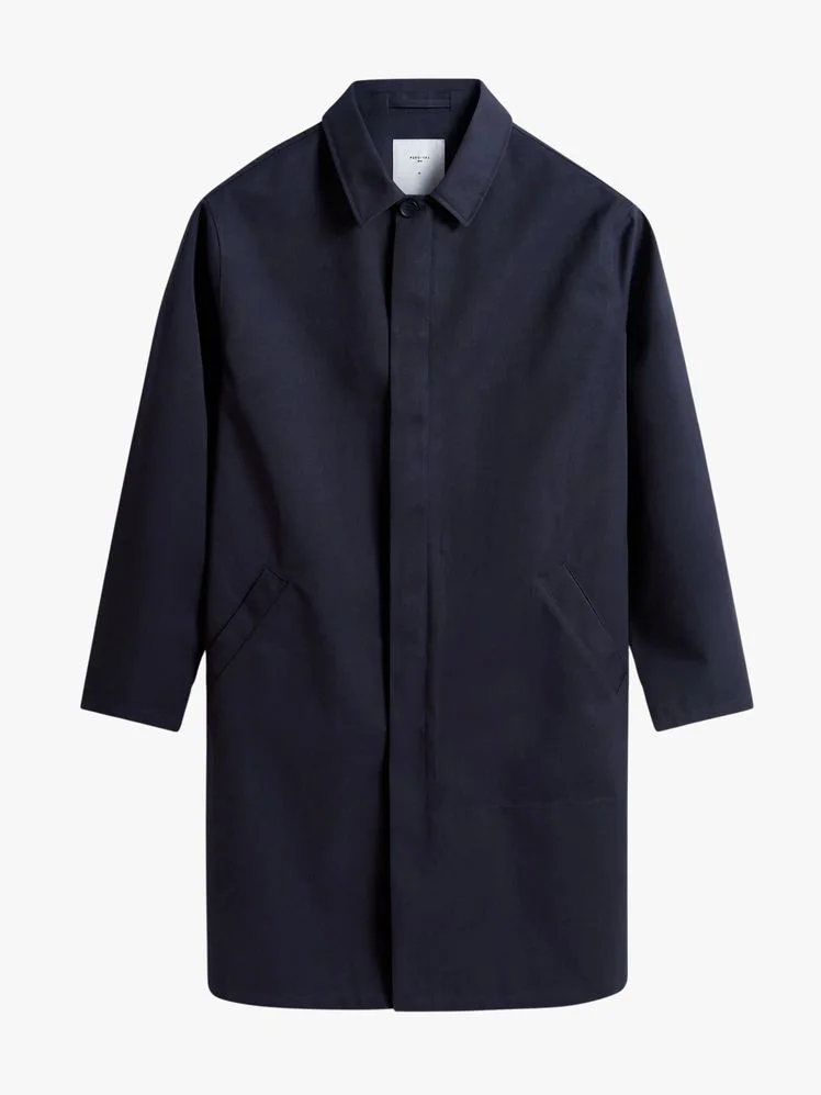 Image may contain Clothing Coat Lab Coat Shirt Long Sleeve and Sleeve