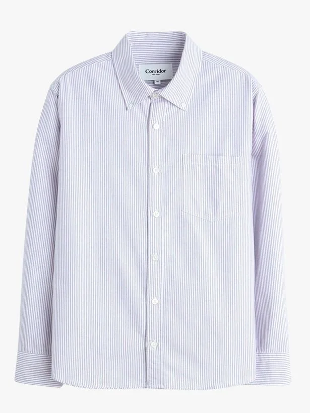 Image may contain Clothing Shirt Long Sleeve Sleeve and Dress Shirt