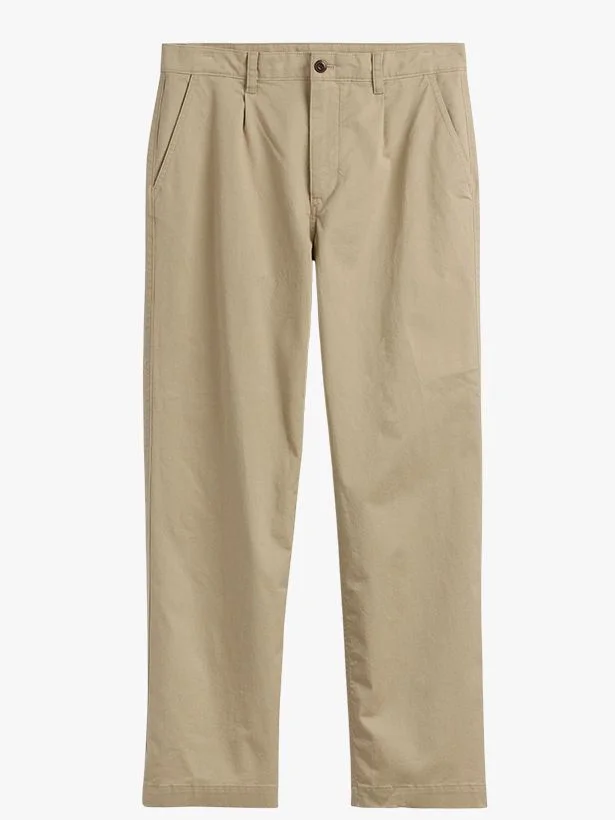 Image may contain Clothing Pants Khaki Shirt Home Decor and Linen