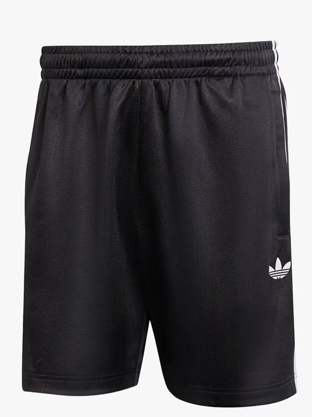 Image may contain Clothing Shorts and Swimming Trunks