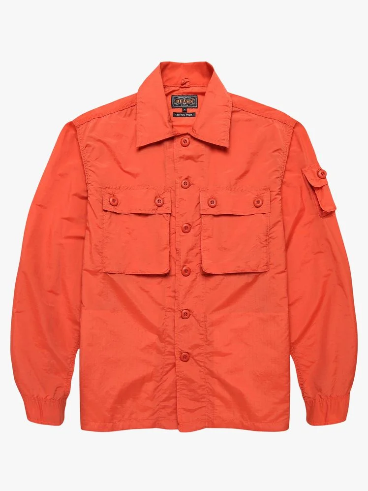 Image may contain Clothing Long Sleeve Sleeve Shirt Coat and Jacket