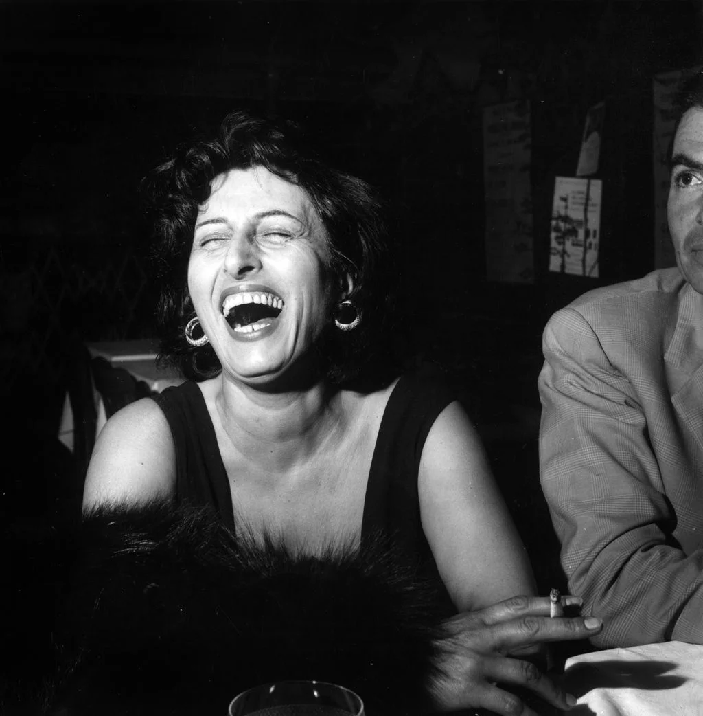 Image may contain Anna Magnani Face Head Person Photography Portrait Happy Laughing Adult Accessories and Earring
