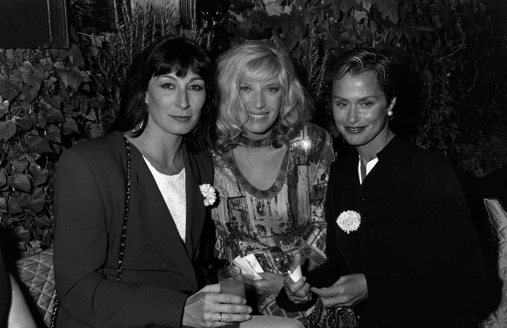 Image may contain Anjelica Huston Lauren Hutton Monica Vitti Clothing Formal Wear Suit People Person and Adult