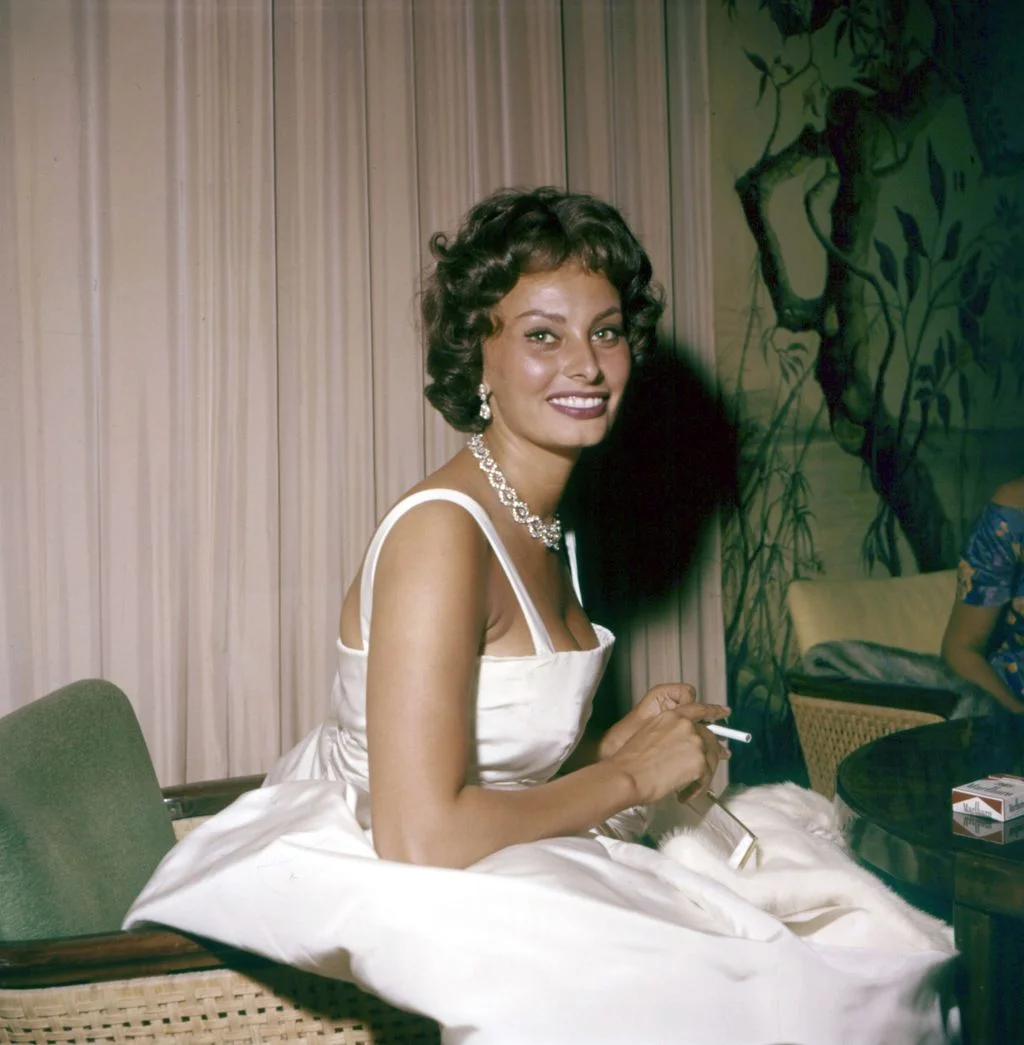 Image may contain Sophia Loren Clothing Dress Accessories Jewelry Necklace Face Head Person and Photography
