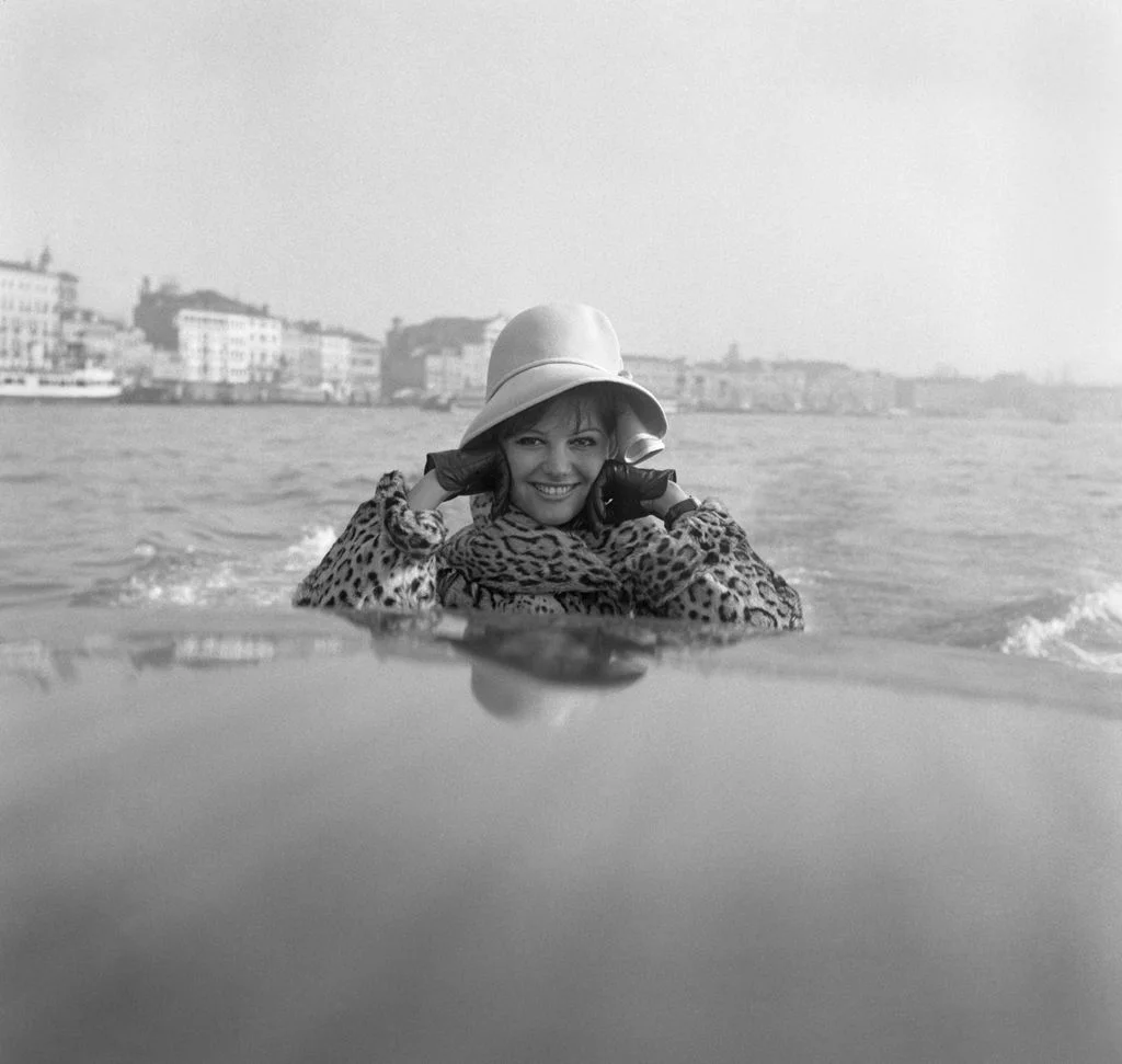 Image may contain Claudia Cardinale Face Head Person Photography Portrait Clothing Hat Coat Nature and Outdoors