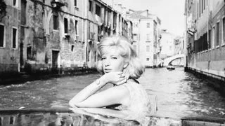 Image may contain Monica Vitti Face Head Person Photography Portrait City Water Waterfront Child and Urban