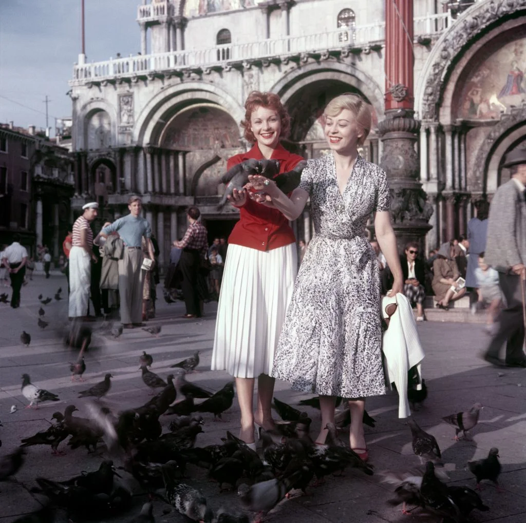 Image may contain Giulietta Masina Françoise Arnoul Clothing Skirt Dress Face Head Person Photography and Portrait