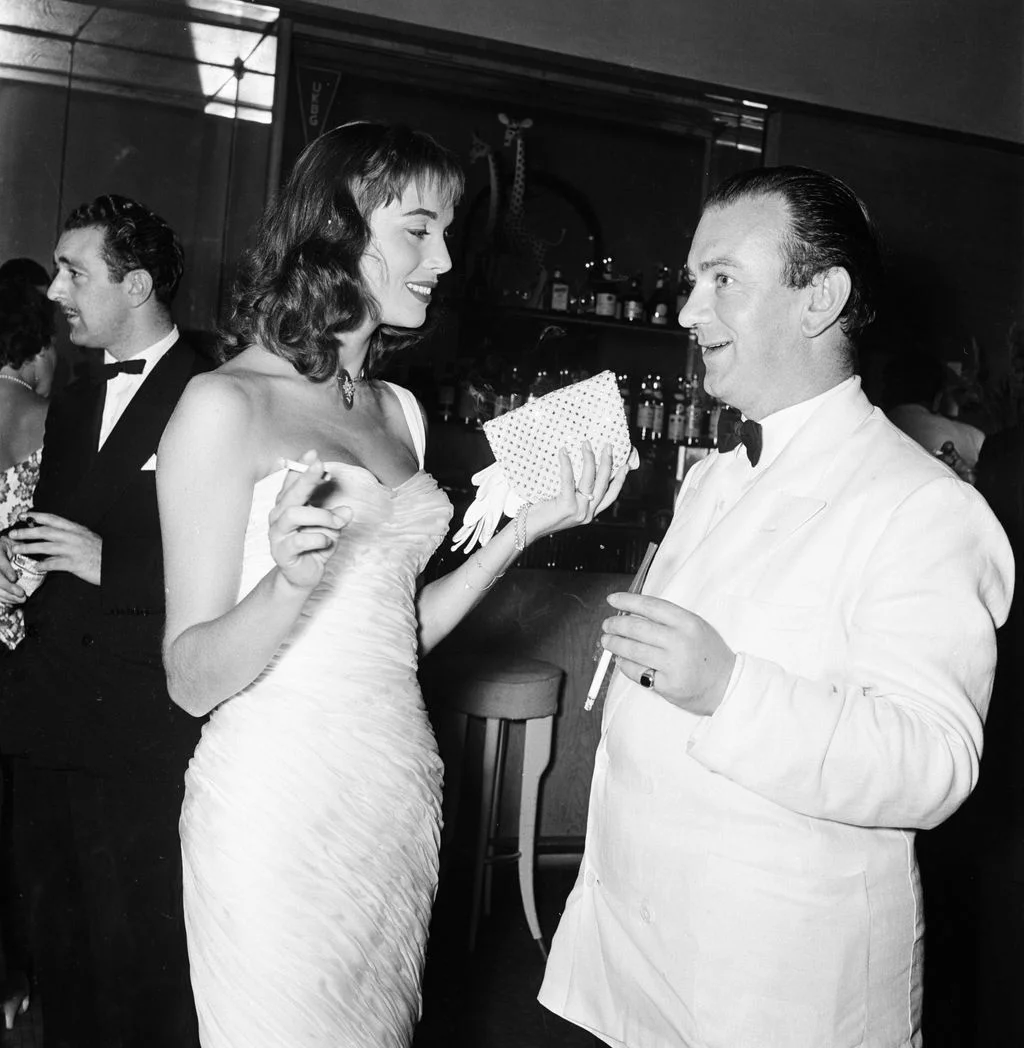 Image may contain Elsa Martinelli Clothing Formal Wear Suit Dress Fashion Gown Wedding Wedding Gown and Tuxedo