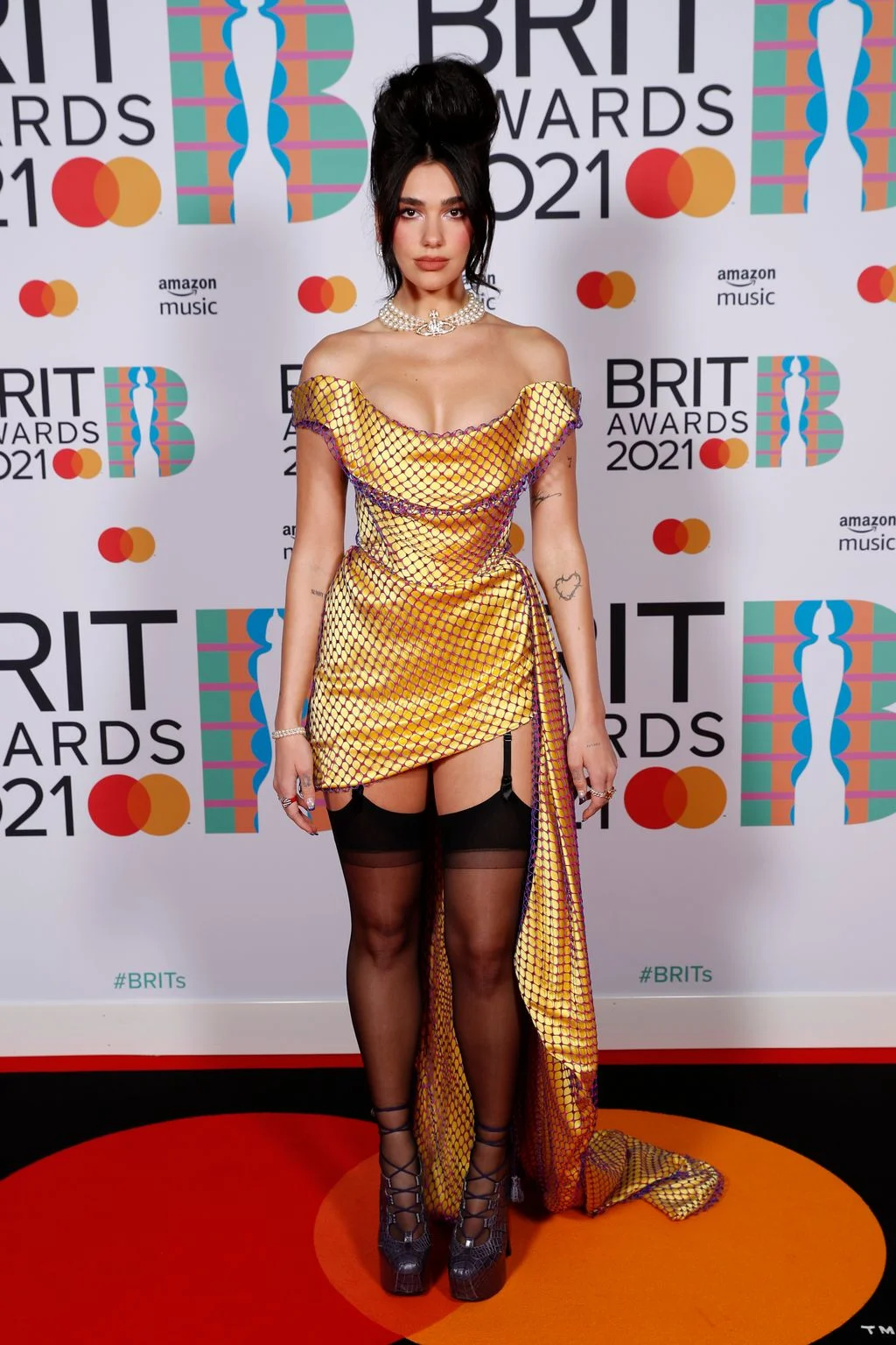 In custom Vivienne Westwood at the Brit Awards.