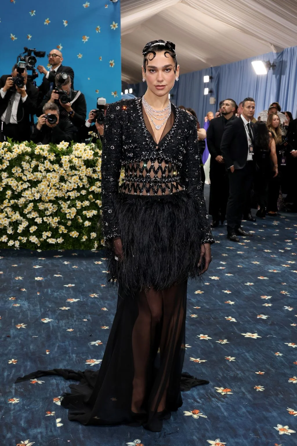 Image may contain Dua Lipa Person Adult Camera Electronics Accessories Jewelry Necklace Clothing Footwear and Shoe