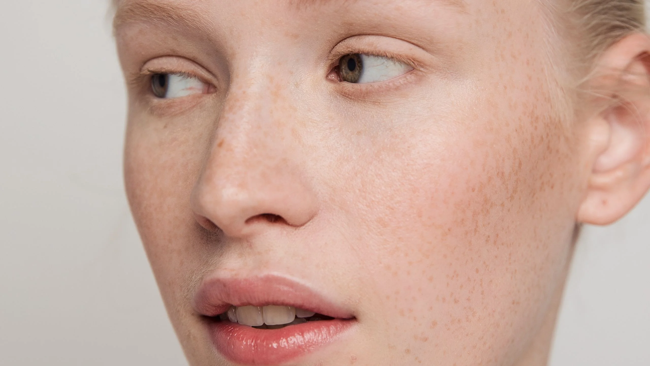 Image may contain Head Person Face Adult Photography Portrait Skin Body Part and Neck