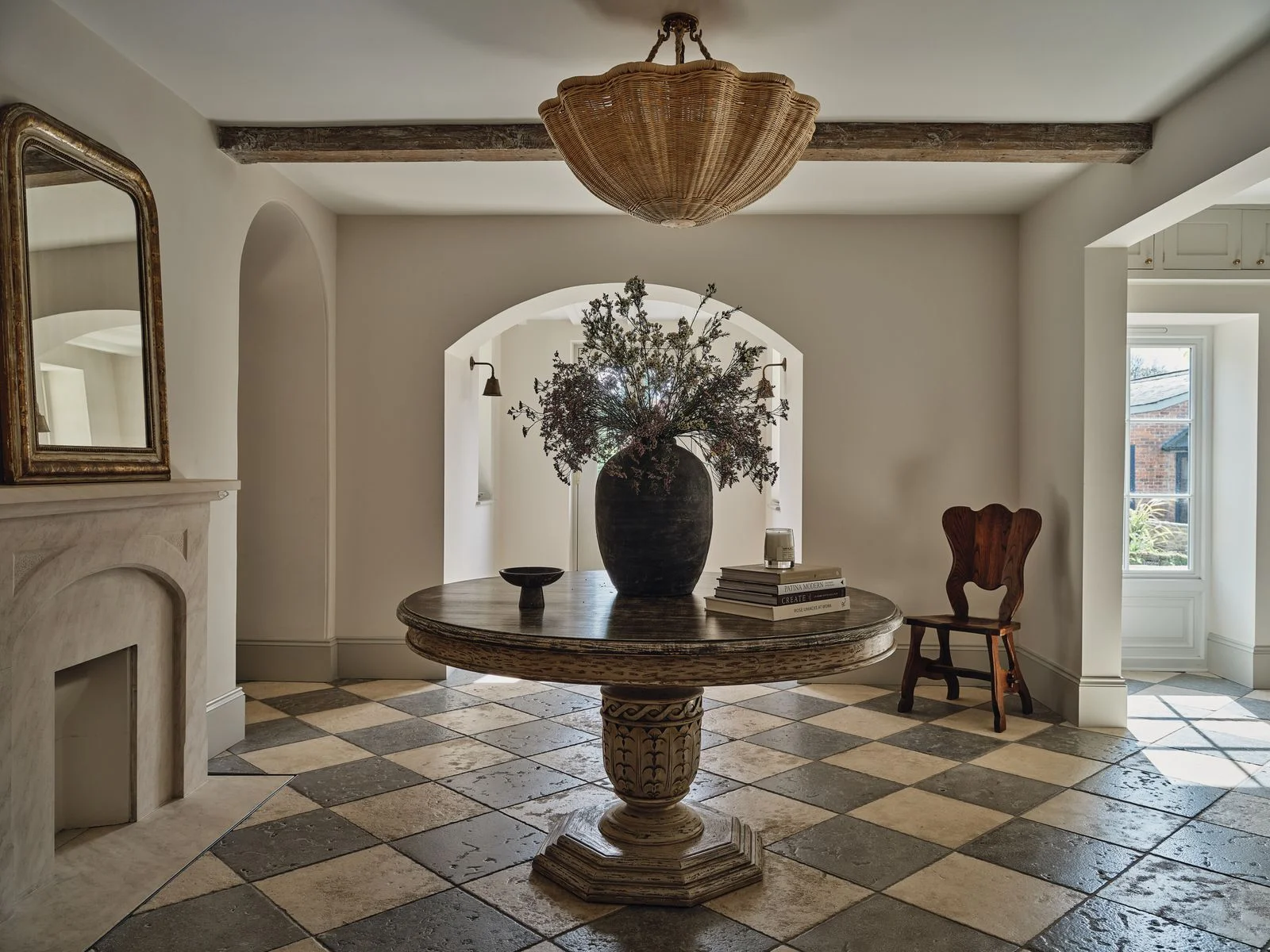 Image may contain Furniture Table Floor Plant Tabletop Lamp Dining Table Architecture Building and Dining Room