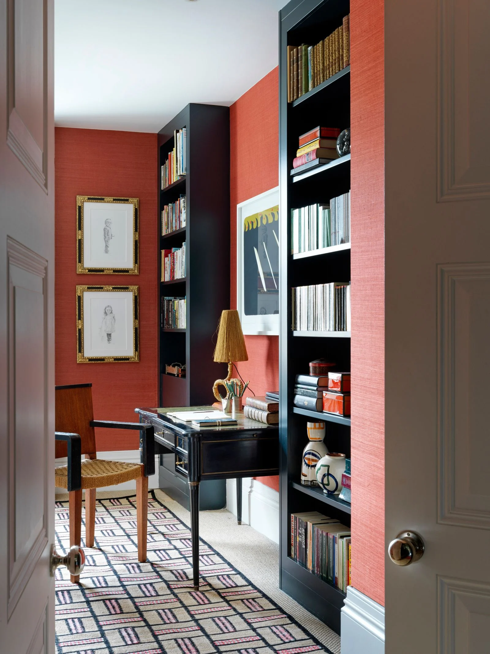 Image may contain Furniture Bookcase Table Indoors Interior Design Person Chair and Home Decor