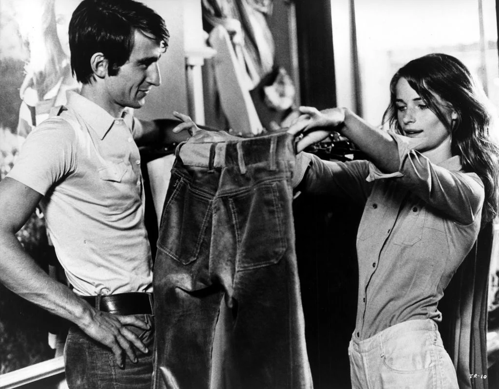 Image may contain Sam Waterston Clothing Coat Jacket Adult Person Jeans Pants Body Part Finger and Hand