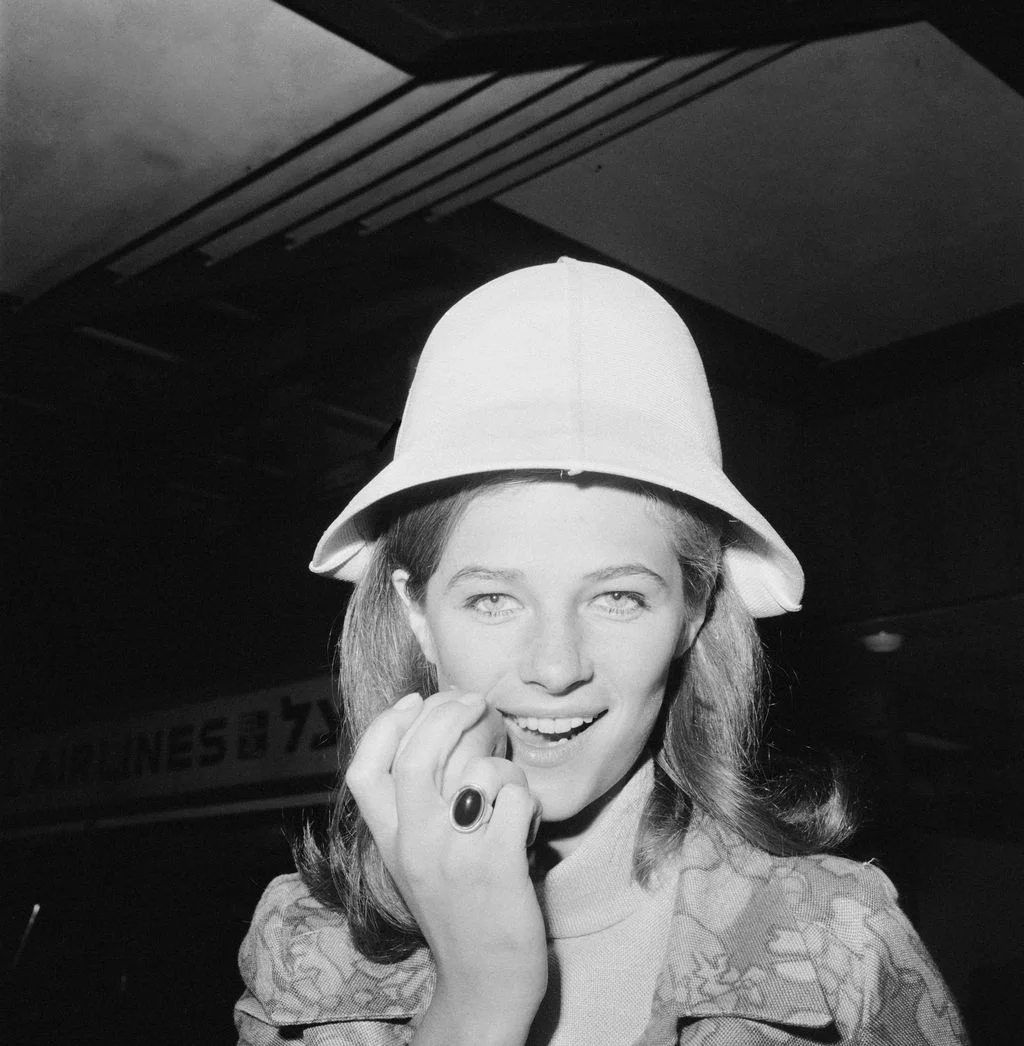 Image may contain Charlotte Rampling Face Head Person Photography Portrait Clothing Hardhat Helmet and Hat