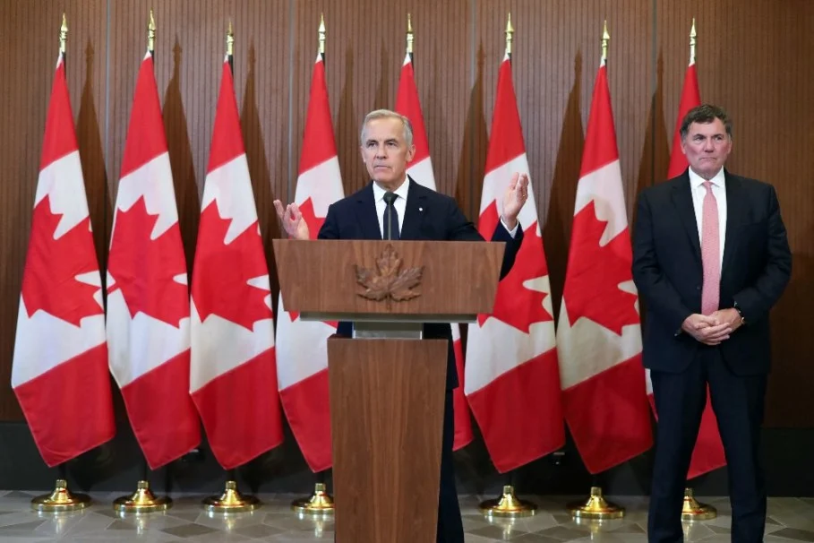 Canadian Prime Minister Mark Carney speaks at a press conference alongside Dominic LeBlanc, Minister responsible for Canada-U.S. Trade, over the weekend.
