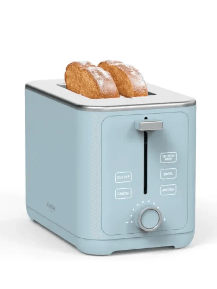Image may contain: Device, Appliance, Electrical Device, Bread, Food, and Toaster