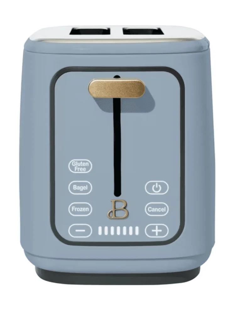 Image may contain: Device, Appliance, Electrical Device, Toaster, Bottle, and Shaker