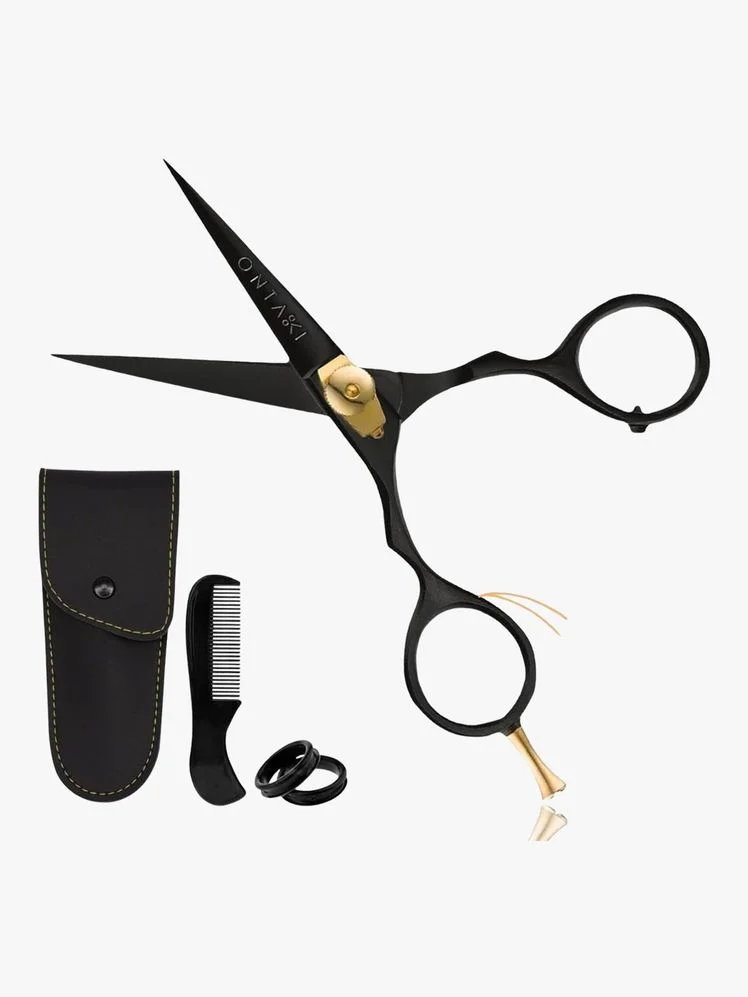 Image may contain: Scissors, Blade, Shears, and Weapon