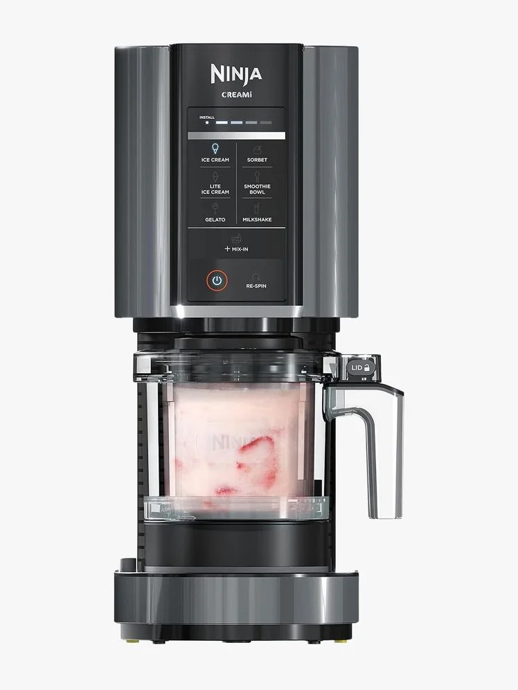 Ice cream maker on a flat background.