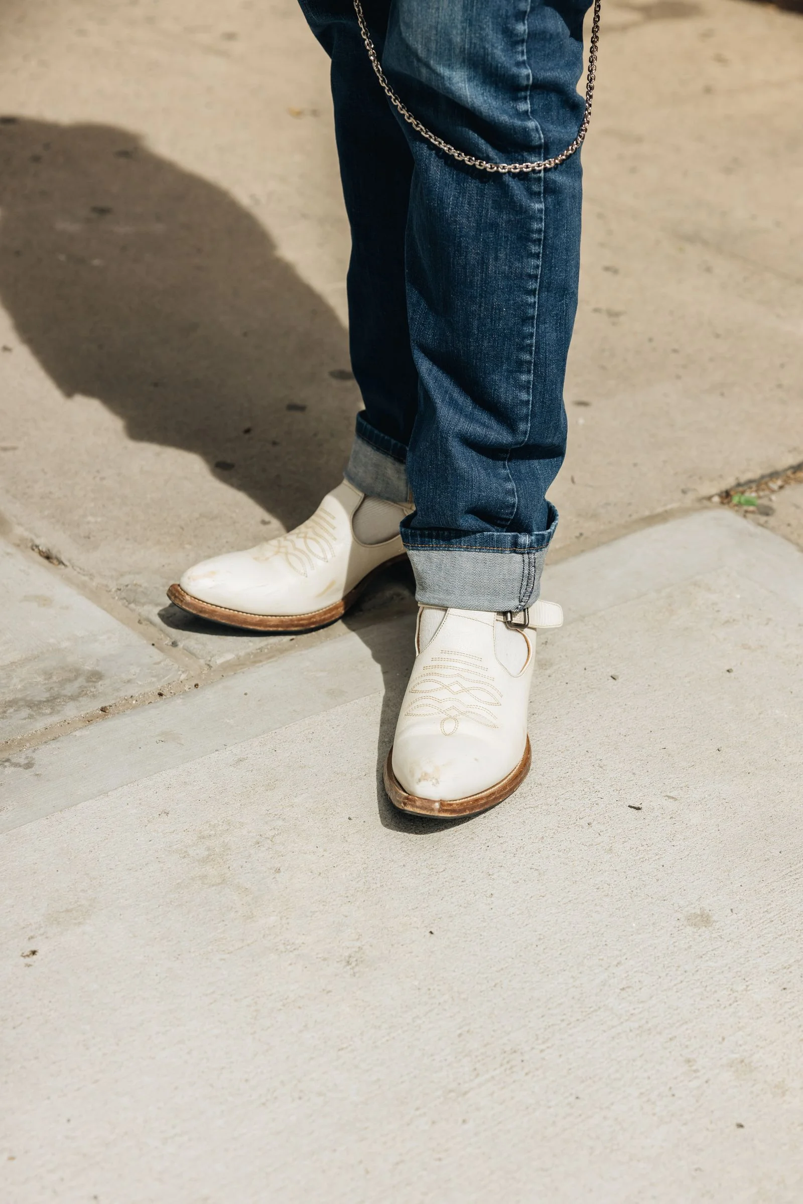 Image may contain Clothing Footwear Shoe Sneaker Pants Person and Jeans