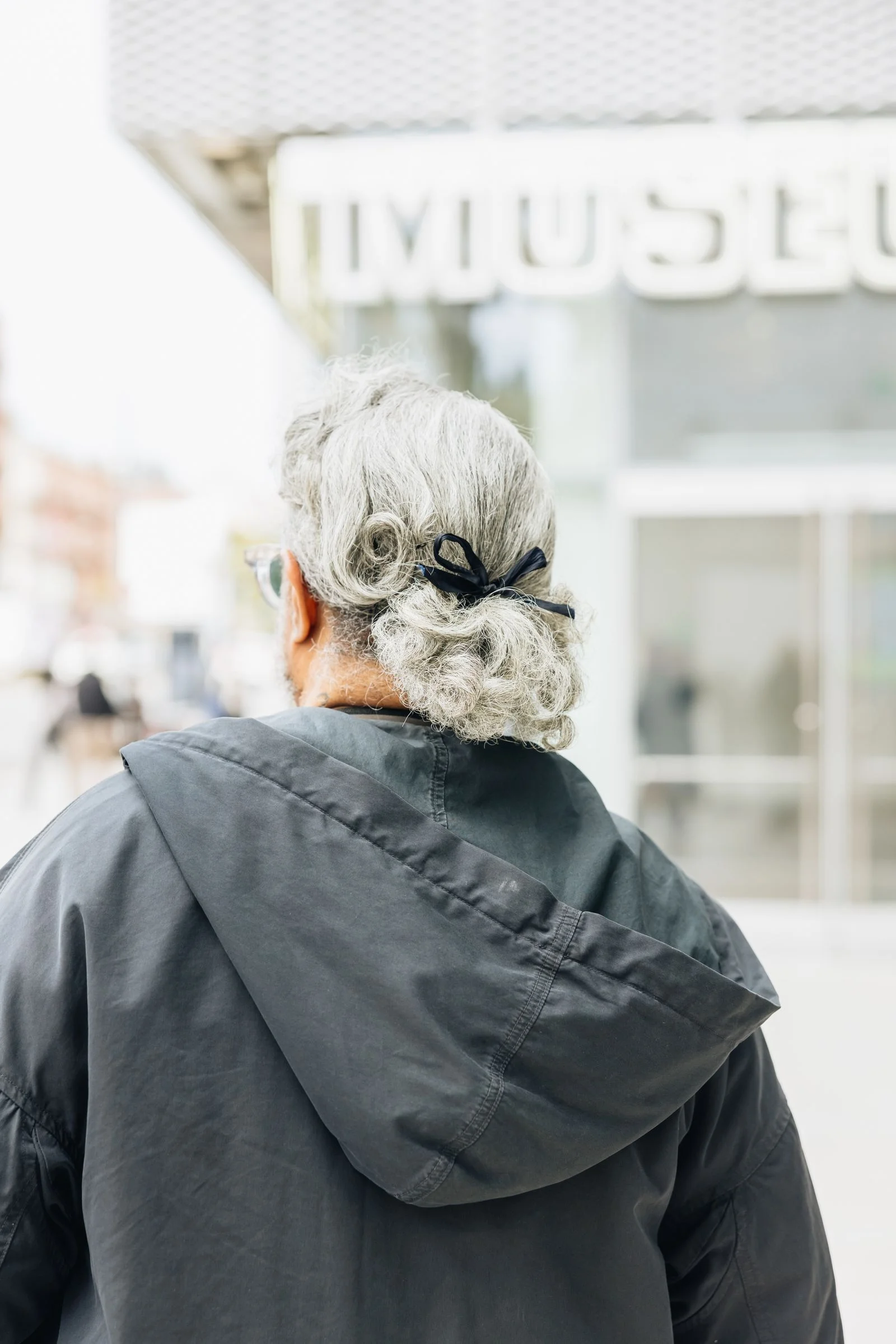 Image may contain Adult Person Blonde Hair Face Head Clothing and Coat
