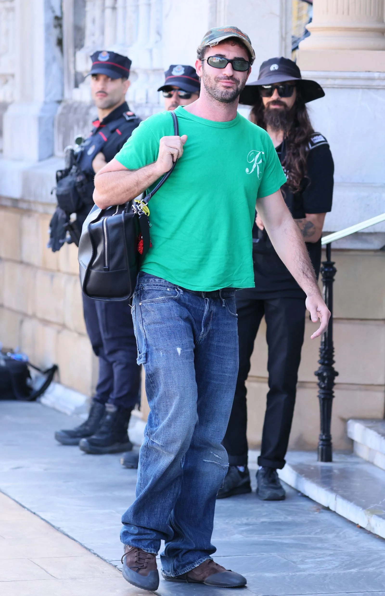 Image may contain Alessandro Michele Bogdan Titomir Clothing Jeans Pants Adult Person Accessories Bag and Handbag