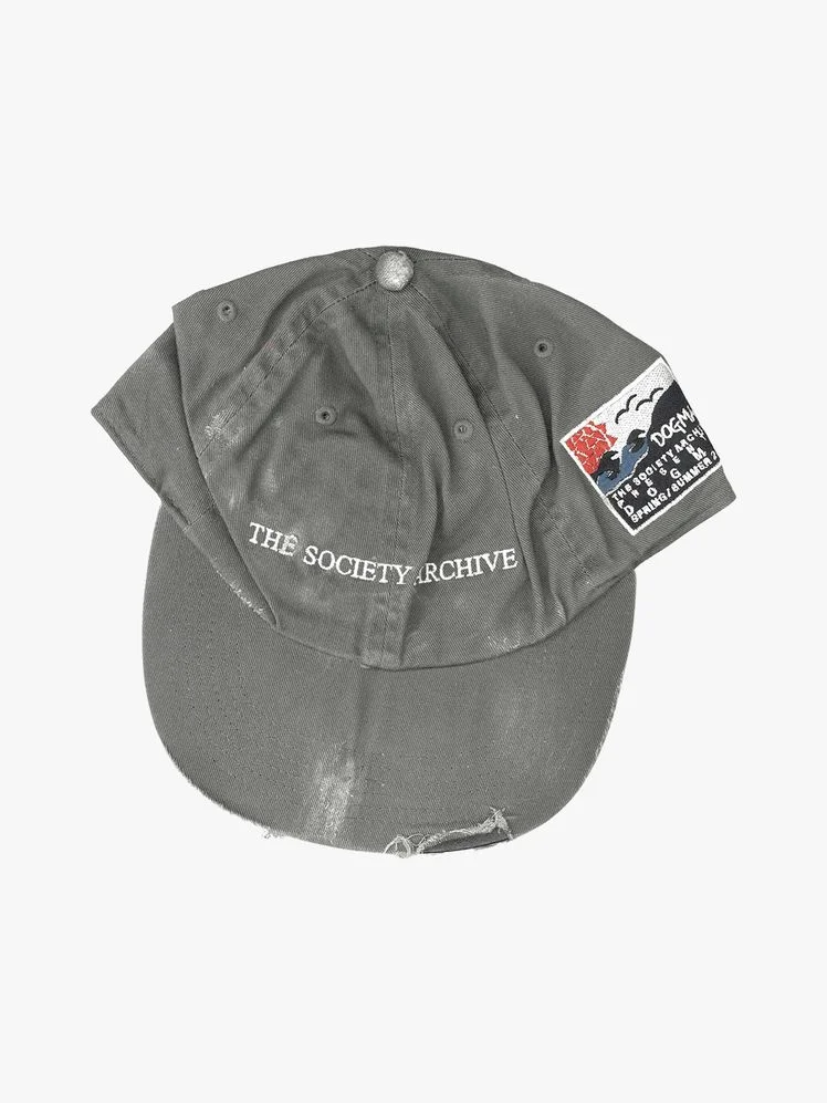 Image may contain: Baseball Cap, Cap, Clothing, and Hat