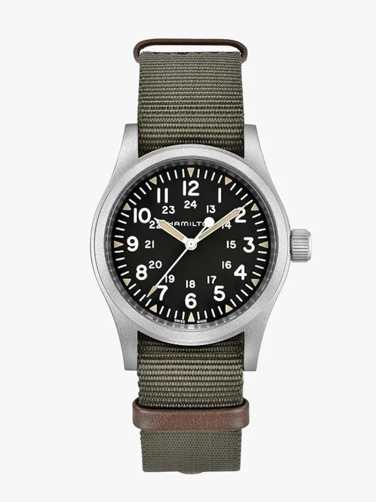 Image may contain: Wristwatch, Arm, Body Part, and Person
