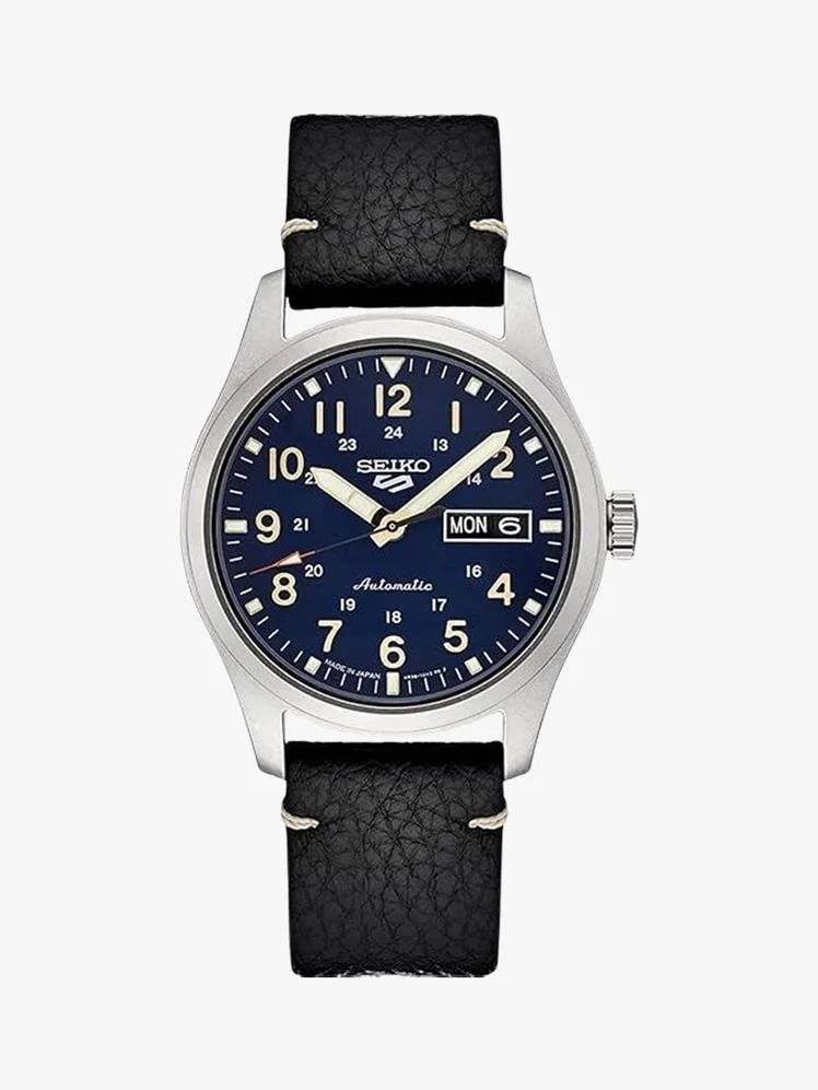 Image may contain: Wristwatch, Arm, Body Part, and Person