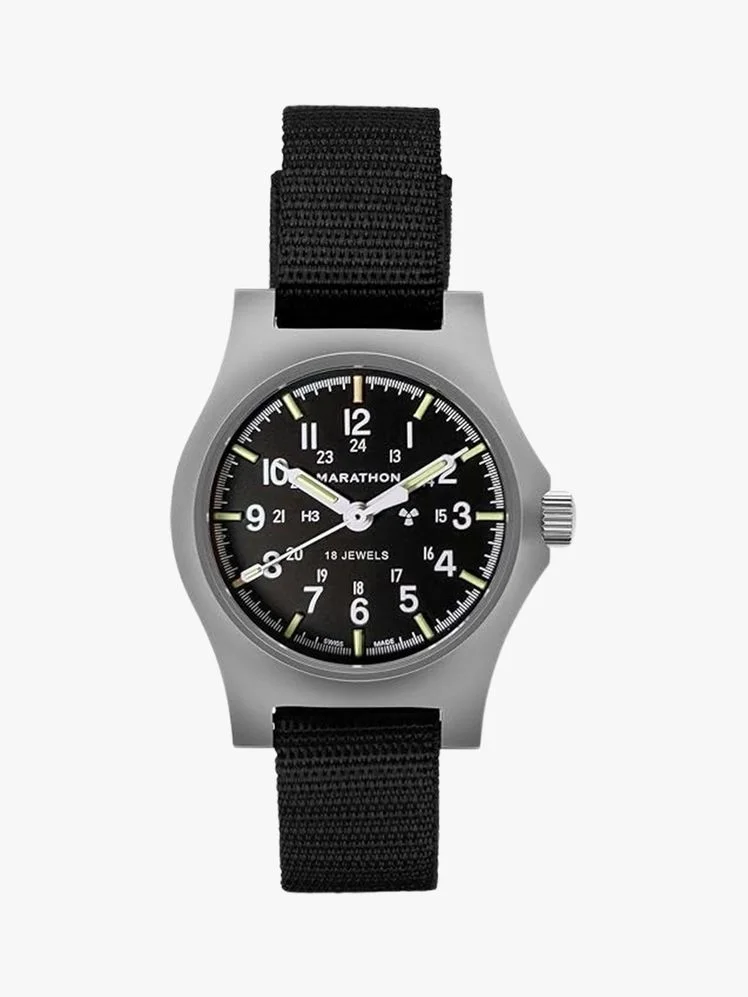 Image may contain: Wristwatch, Arm, Body Part, and Person