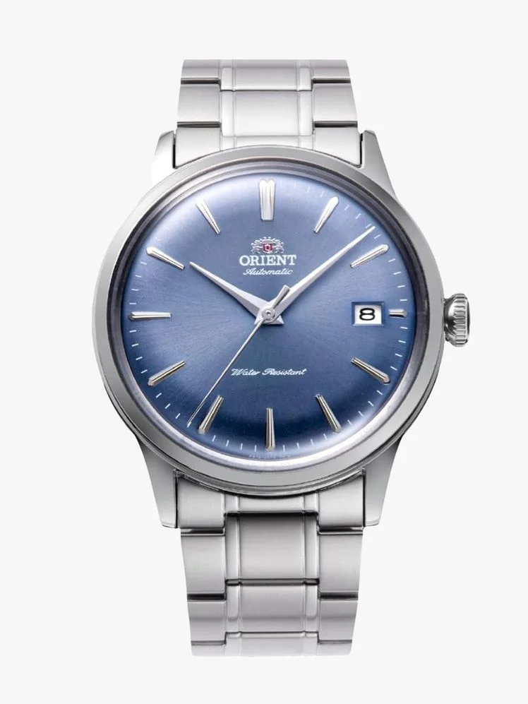 Image may contain: Wristwatch, Arm, Body Part, and Person
